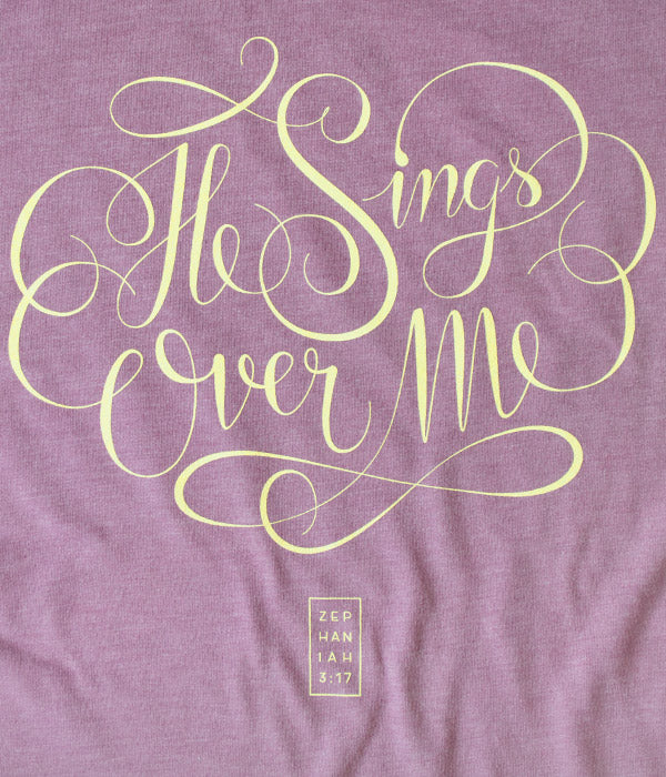 He Sings Over Me Tee – Heather Orchid