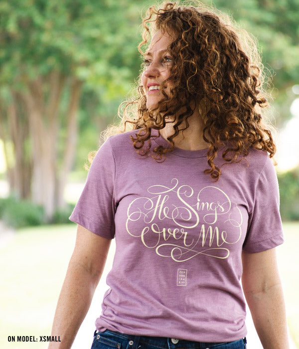 He Sings Over Me Tee – Heather Orchid